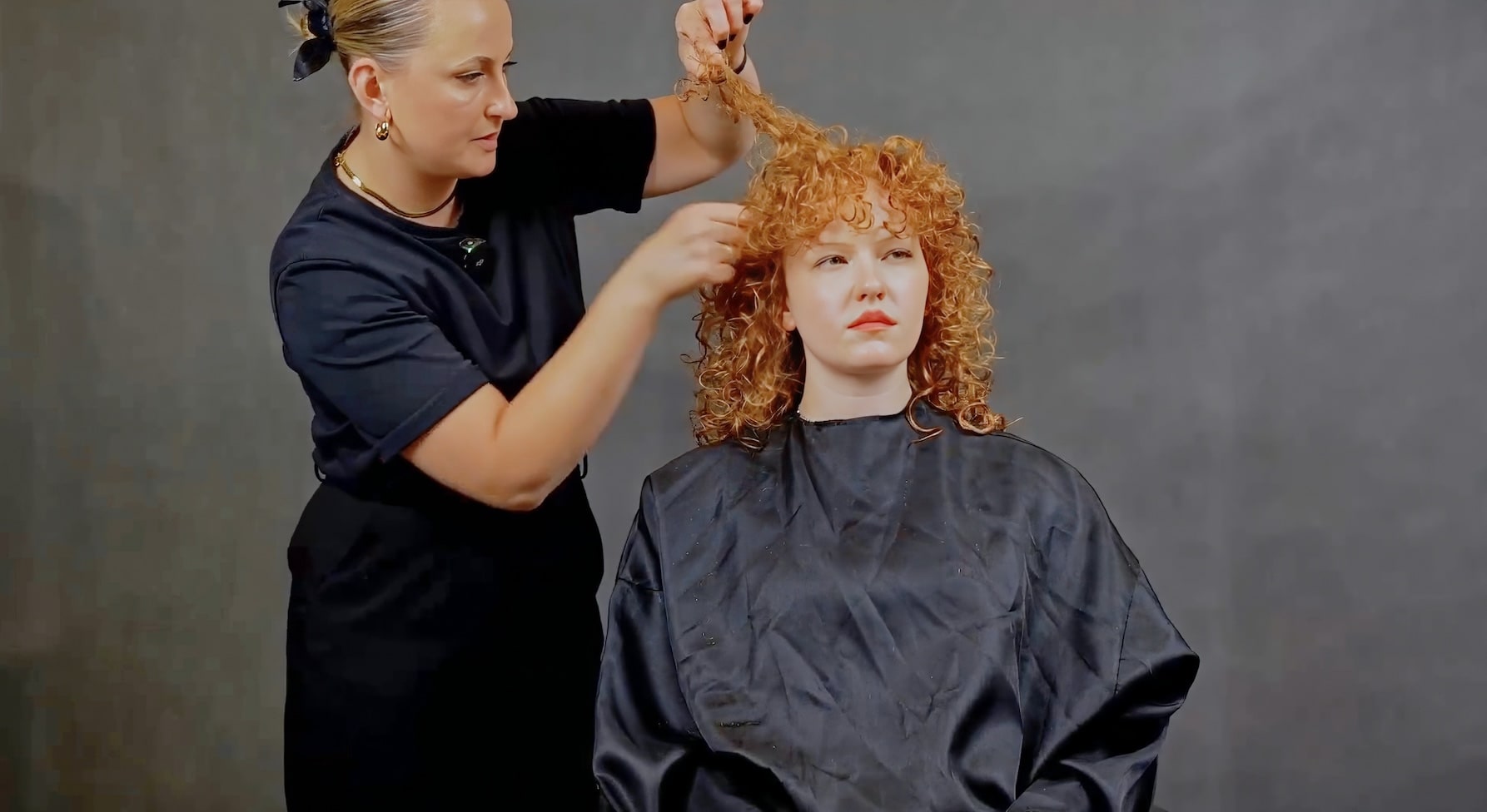 Textured curl cutting on a man